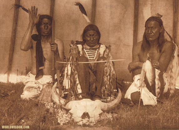 "Huka-Lowapi, Painting the skull - Teton Sioux", by Edward S. Curtis from The North American Indian Volume 3