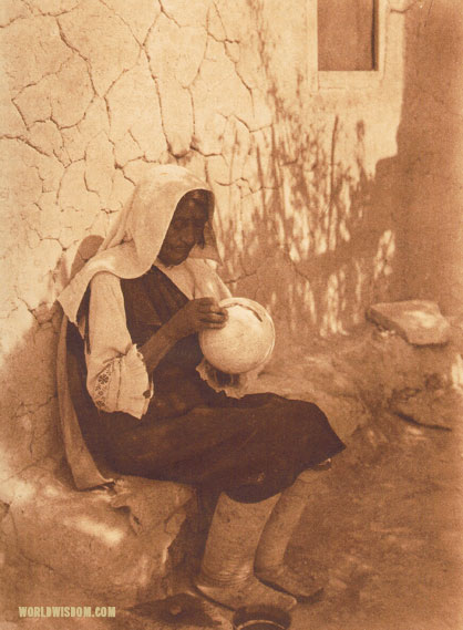 "An Isleta potter", by Edward S. Curtis from The North American Indian Volume 16
